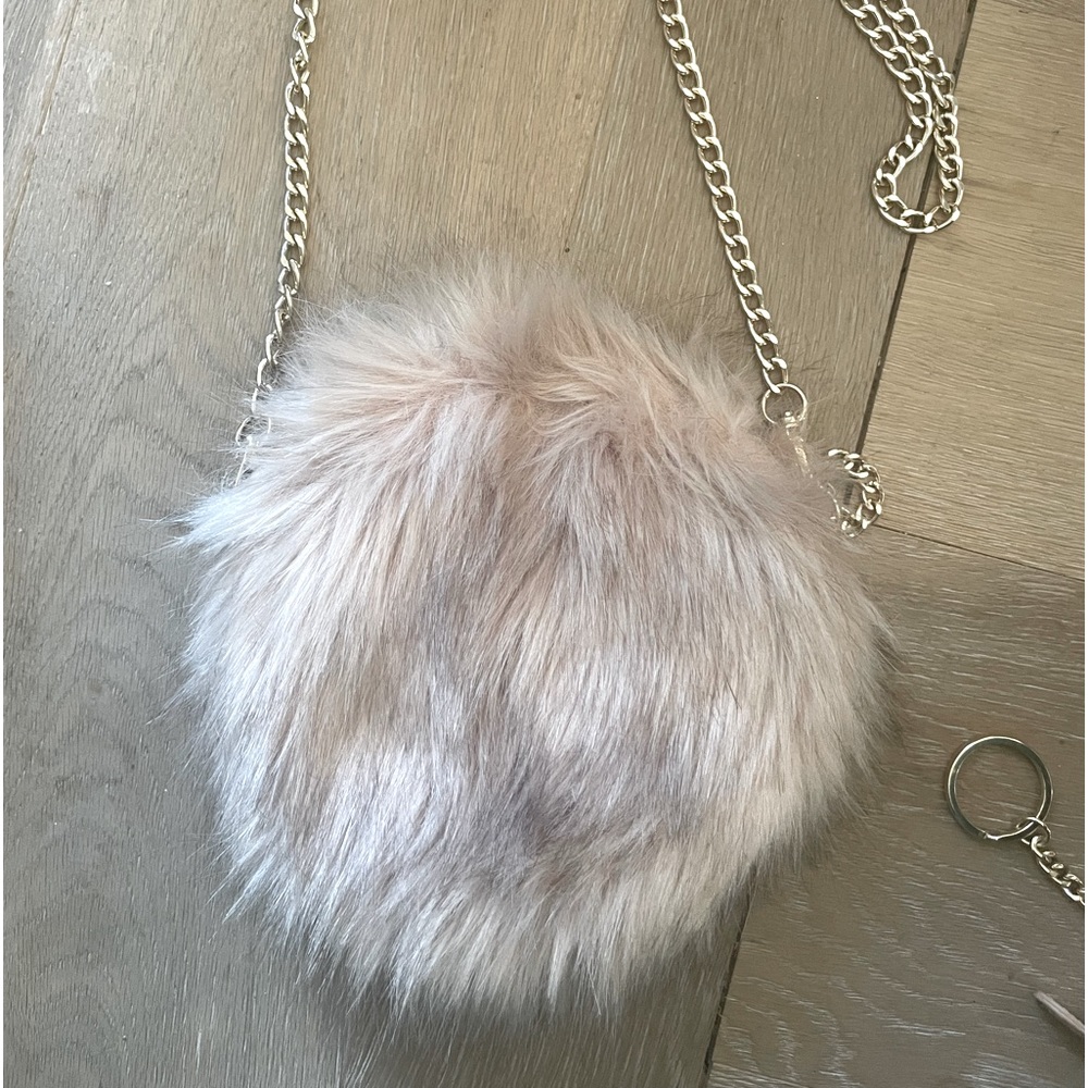 Cute furry purse with gold chain. From a boutique